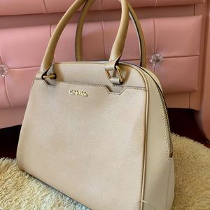 Calvin Klein cream & white leather women’s handbag